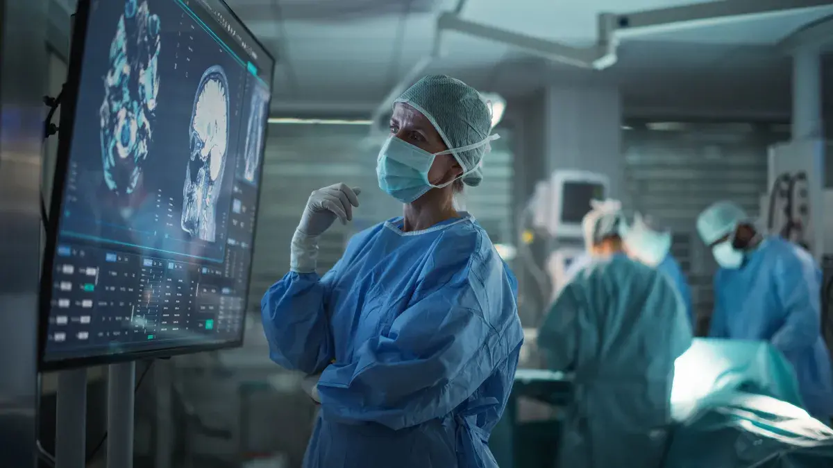 medical professional studying imagery in theatre