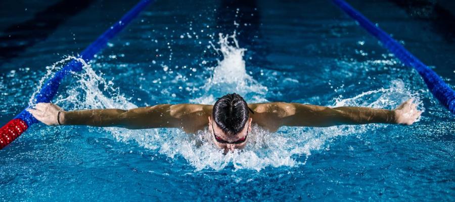 Man swimming in pool