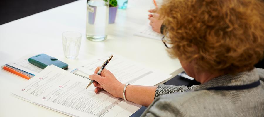 Researcher completing paperwork
