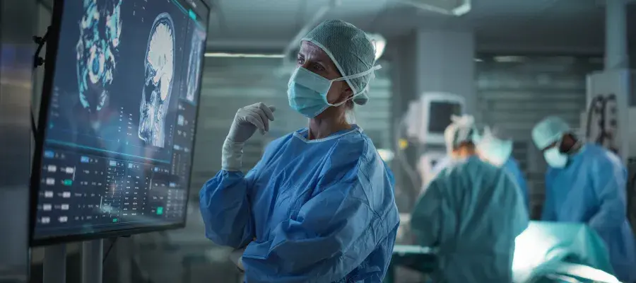 medical professional studying imagery in theatre