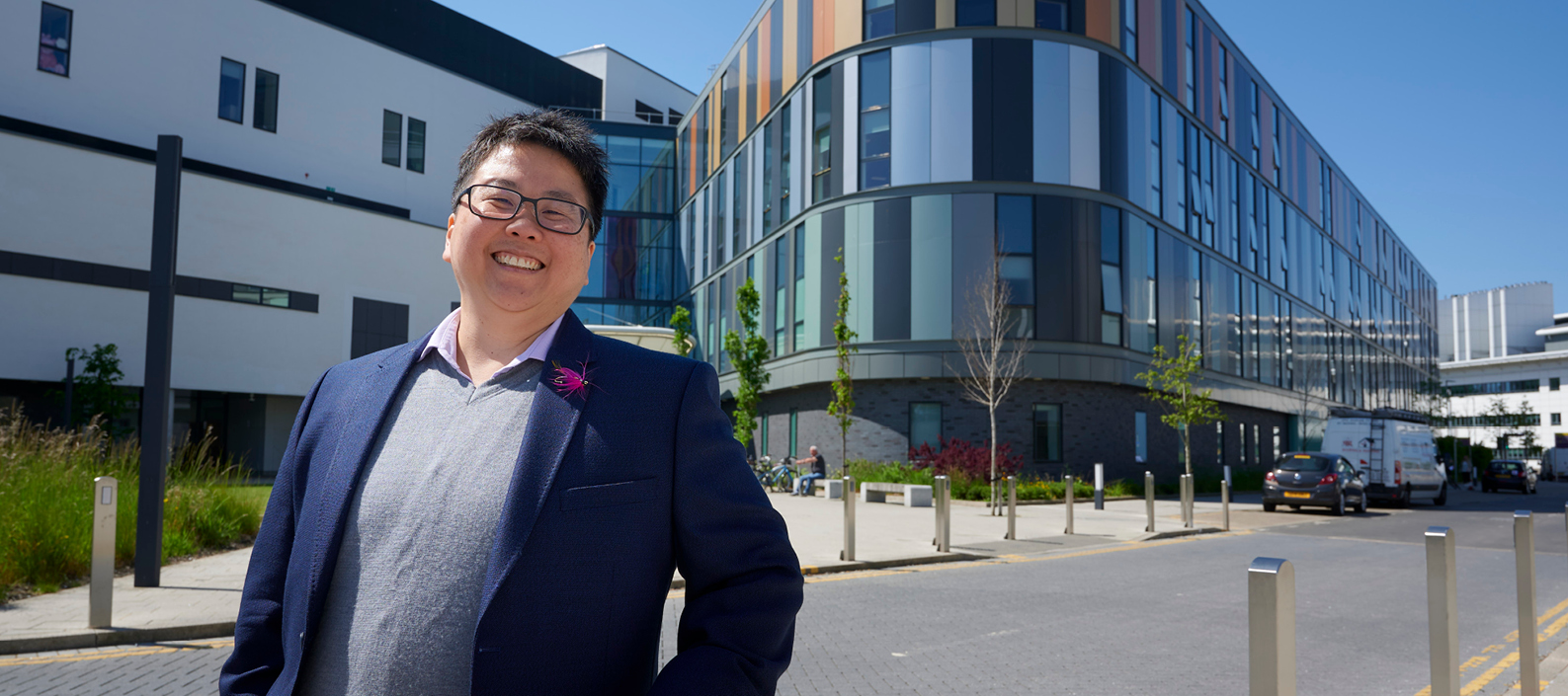 Image of Dr Rsz-Yan Milly Lo outside a building at the University of Edinburgh