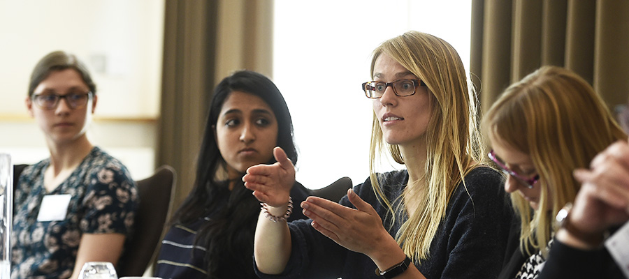 Researcher discussing challenges with external partners